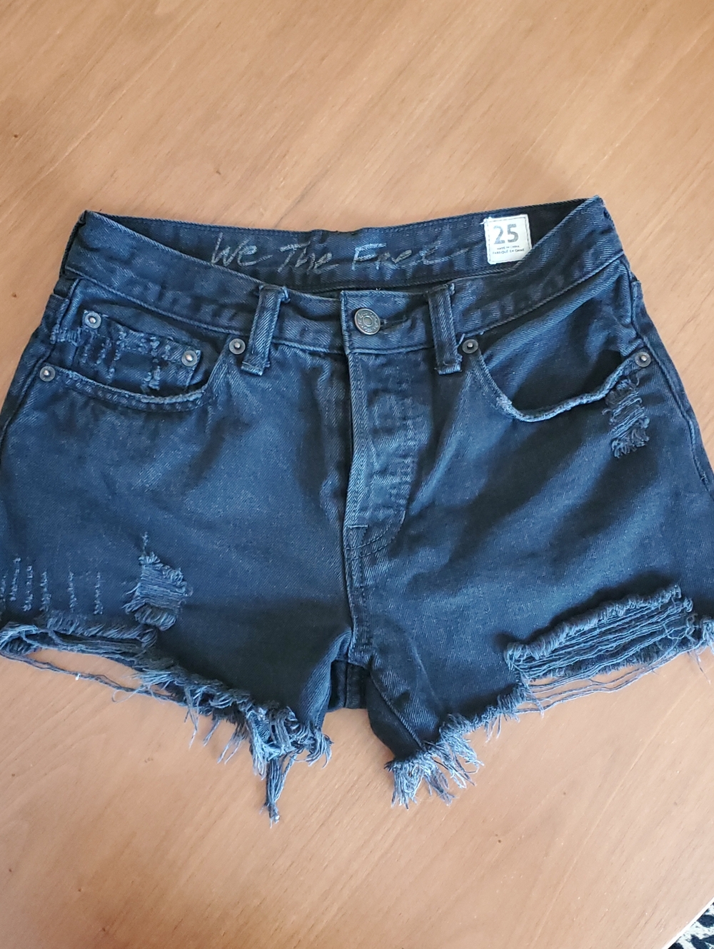 We The Free Black Distressed Denim Cutoff Shorts